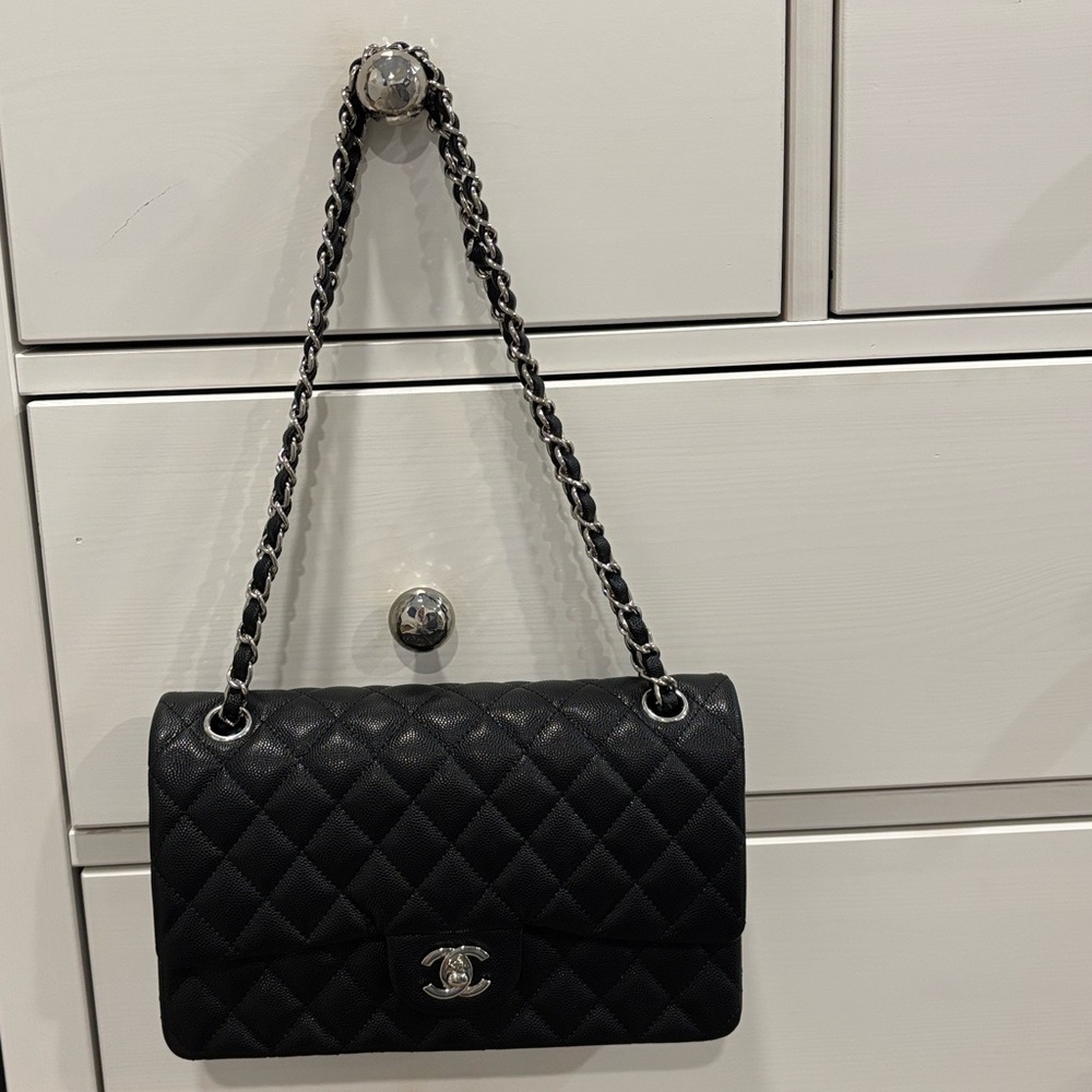 CHANEL medium flap bag black caviar leather with silver hardware